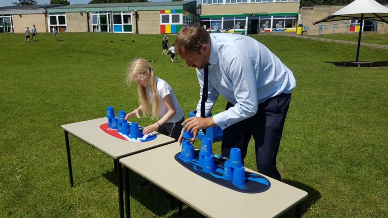 Toby taking part in a speed-stacking challenge