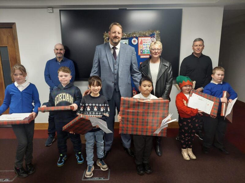 Toby with, winning designer Gerard, and the 5 runners up, Kade, Daisy, Luke, Beau and Lydia. Also pictured - Steve Perez from Casa Hotel, Cllr Kate Sarvent,  and Nick Catt from Weightron Bilanciai.