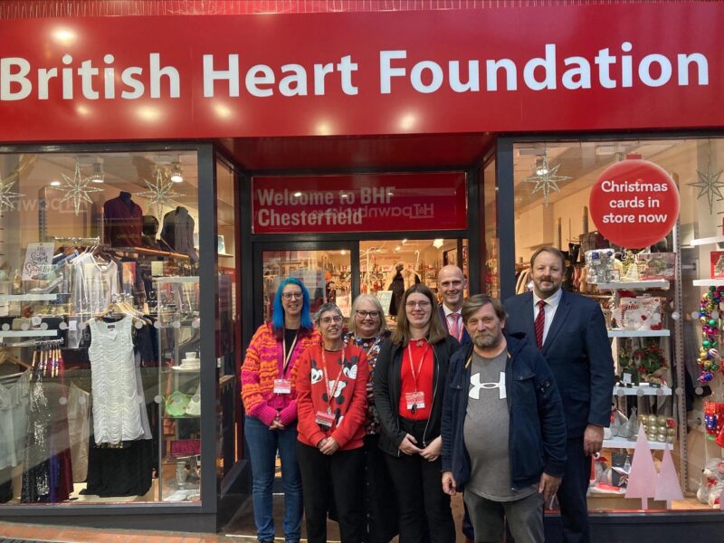 Toby with staff and volunteers at the BHF store in Chesterfield