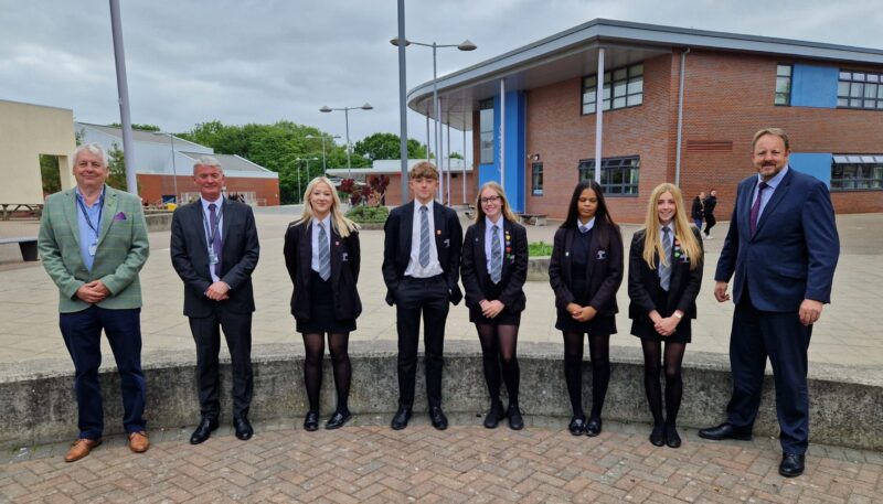 Toby with staff and students