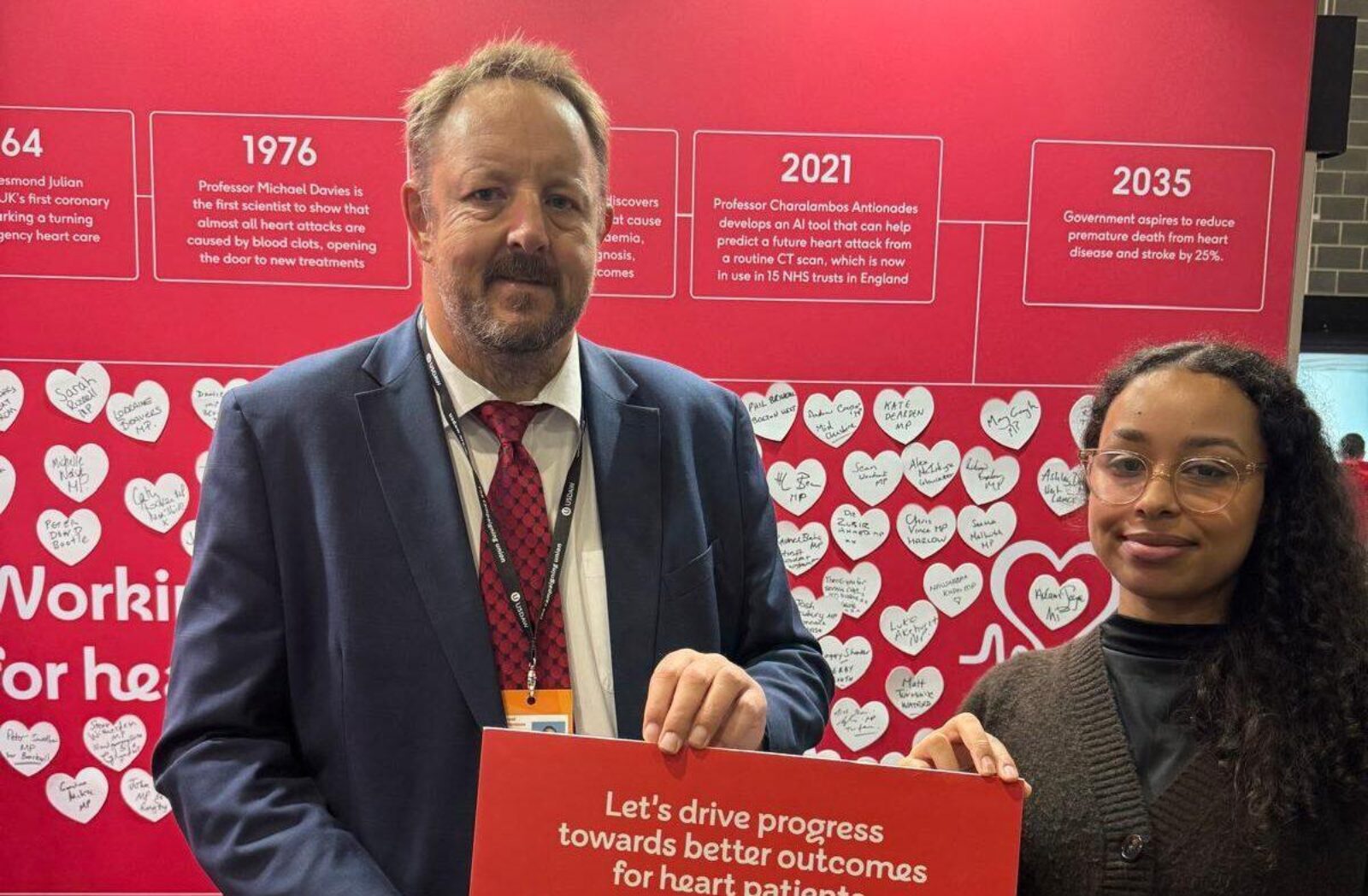 Toby Perkins MP with a BHF campaigner, holding a sign that reads 